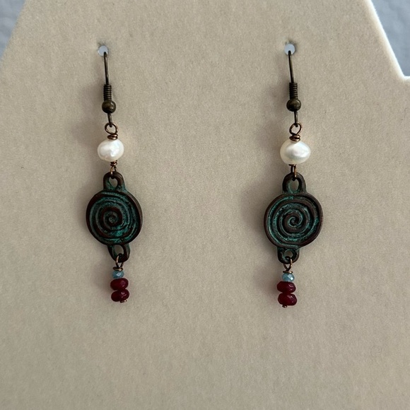 Jewelry - Multi colored earrings. Red bead pearl like bead. Swirl design